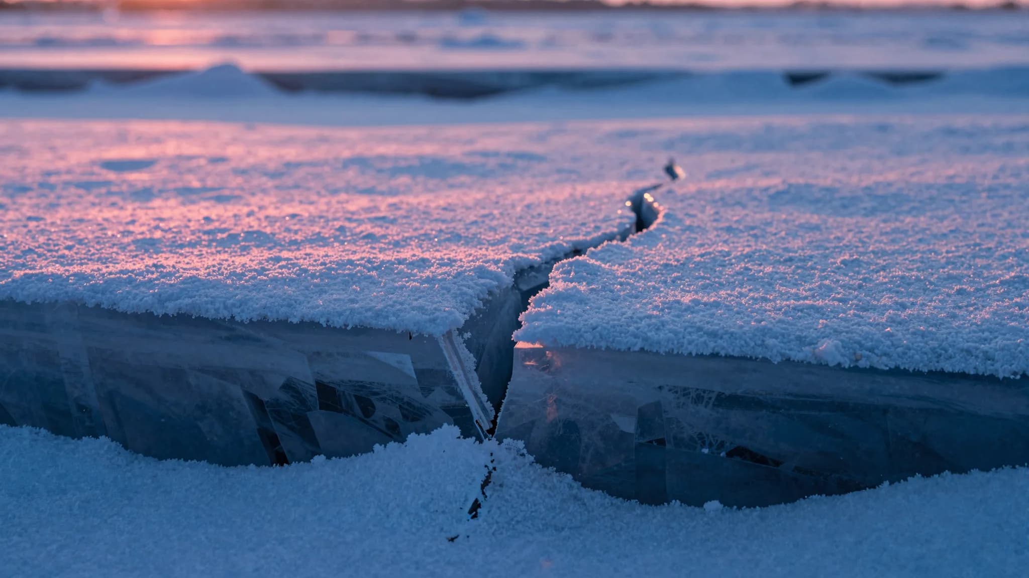 Extreme macro of crystalline snow surface pattern, fine electric-blue and pink interplay