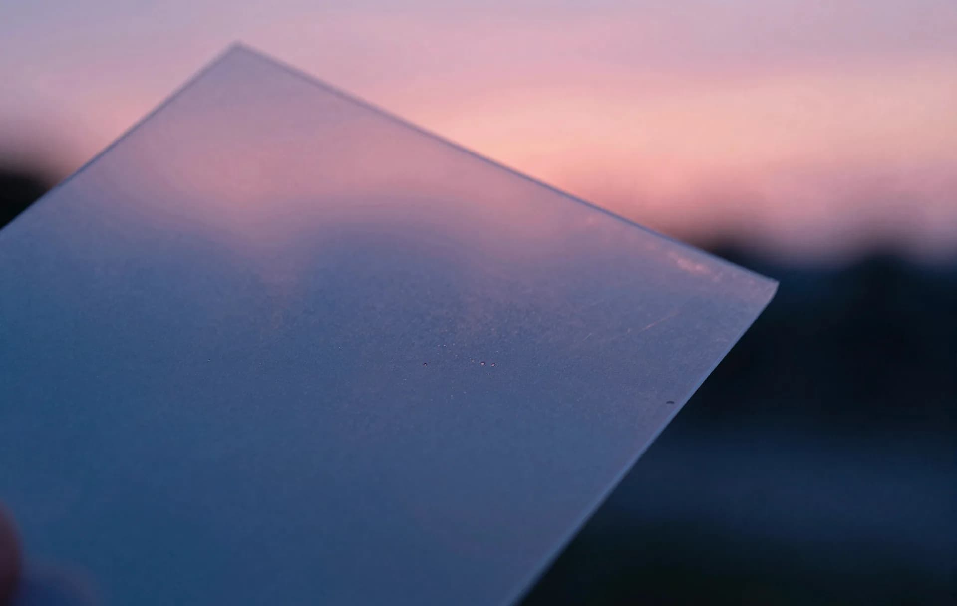 Light diffracting through translucent stacked material, magenta and electric-blue color separation