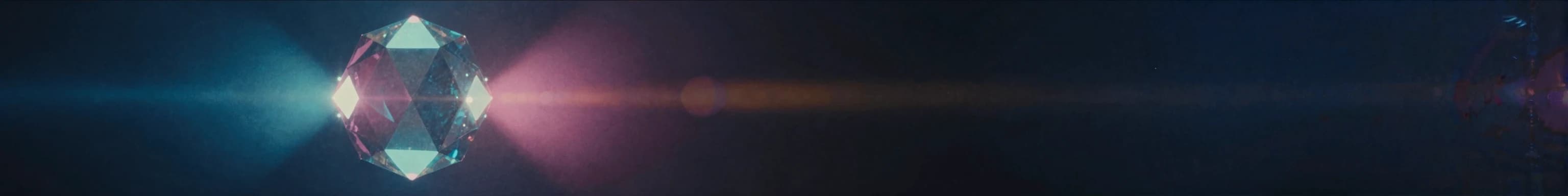 Anamorphic rotating prismatic volume, color-separated refractions in electric-blue and magenta
