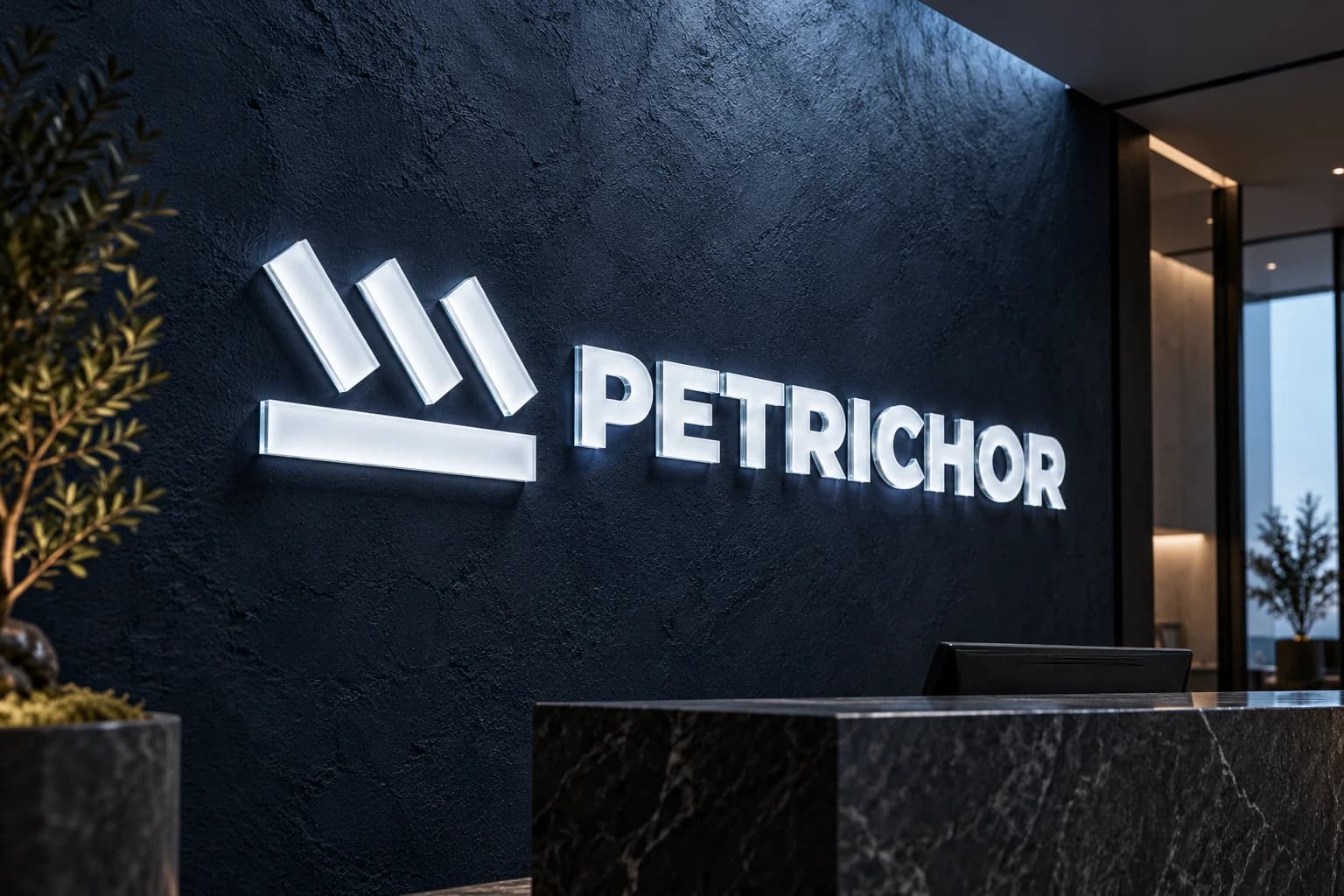 Illuminated Petrichor wall sign behind a dark stone reception desk.