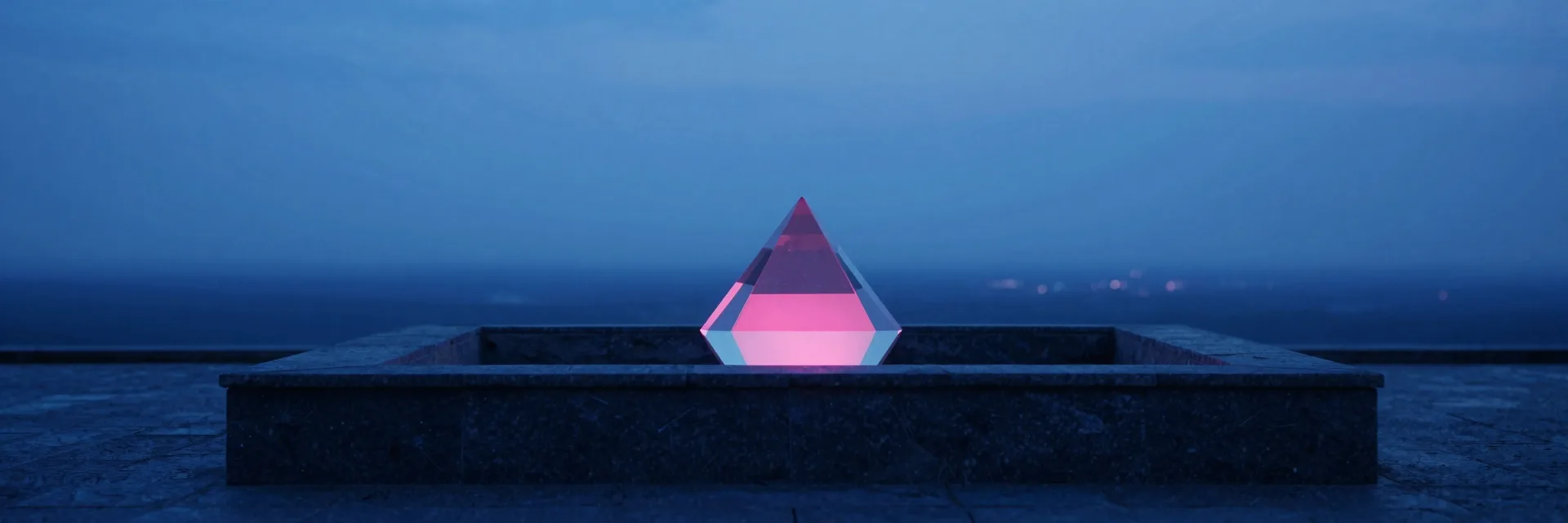 ultra-wide strip of iridescent glass form on dark polished stone with electric-blue and hot-pink refraction - companion image for the Claude sub-agents when-to-use guide