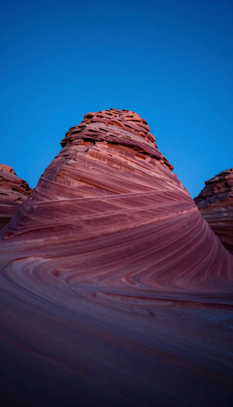tall vertical of dune ridge under electric-blue sky with hot-pink low sun grazing the crest - companion image for the design tokens that survive a rebrand guide