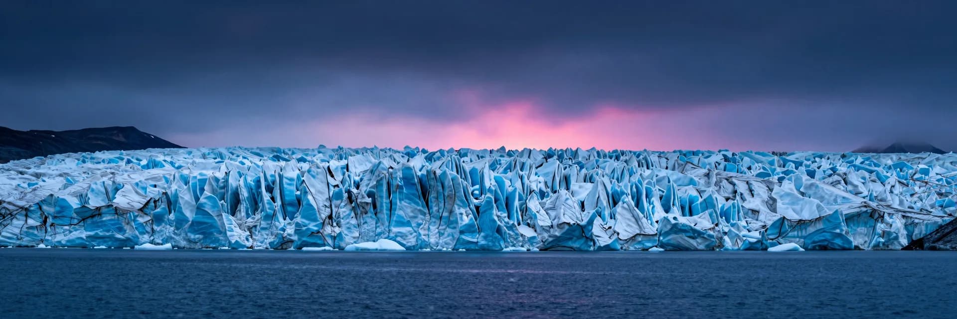 ultra-wide strip of frozen water form under electric-blue twilight with hot-pink sunset - companion image for the git worktrees for parallel agents guide