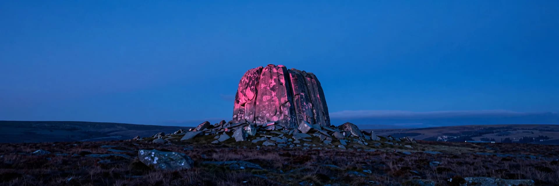 ultra-wide strip of alpine ridge form under electric-blue sky with hot-pink sunset accent - hero image for the Gorgias vs Zendesk for a DTC stack guide