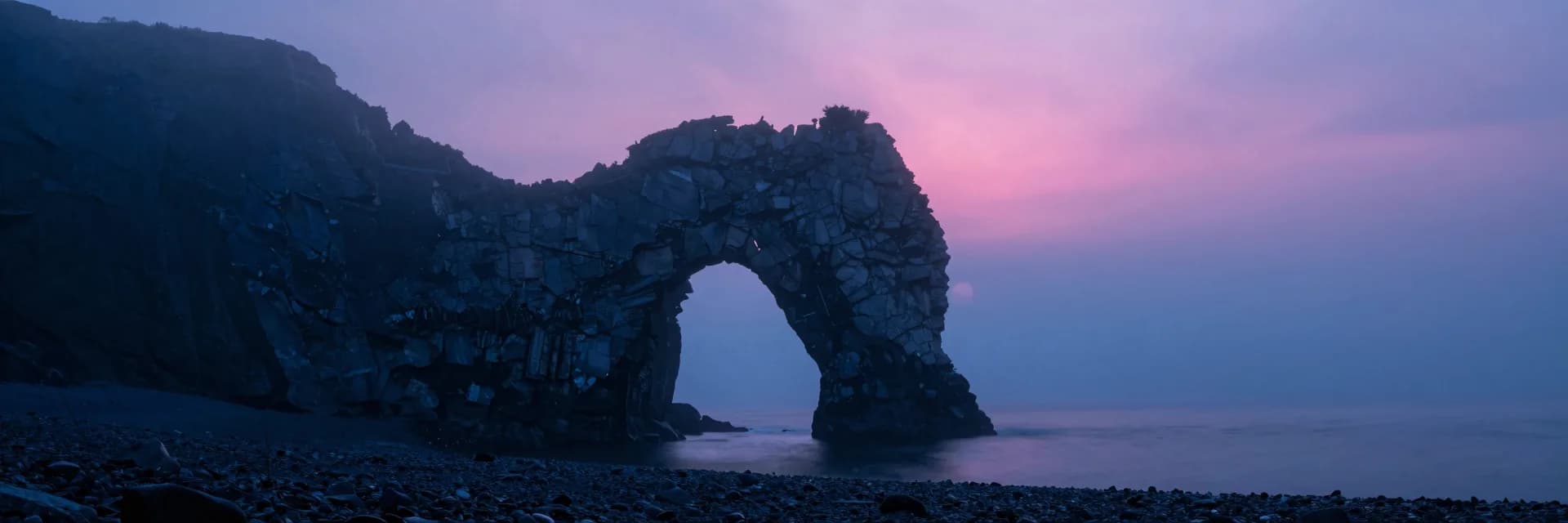 ultra-wide strip of coastal sea stack or arch under electric-blue sky with hot-pink sunset - companion image for the iOS 17 ATT and pixel breakage explainer
