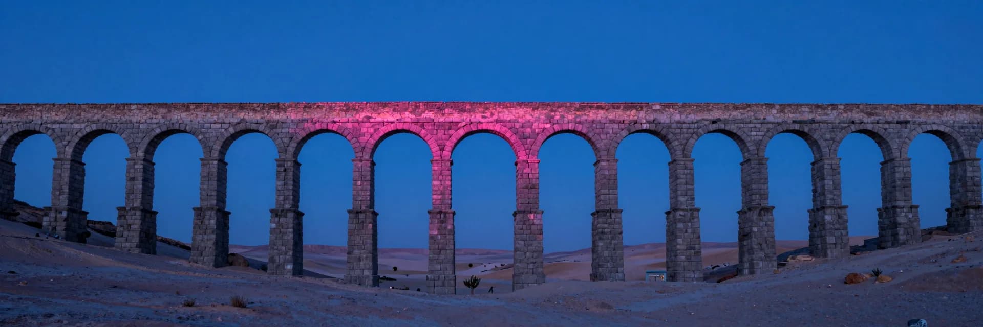 ultra-wide strip of architectural form aligned to the horizon under electric-blue sky with hot-pink sunset - companion image for the MCP server architecture basics guide