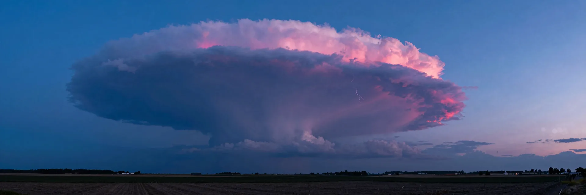 ultra-wide strip of electric-blue atmospheric scene with hot-pink sunset accent - hero image for the mobile-converting PDP patterns 2026