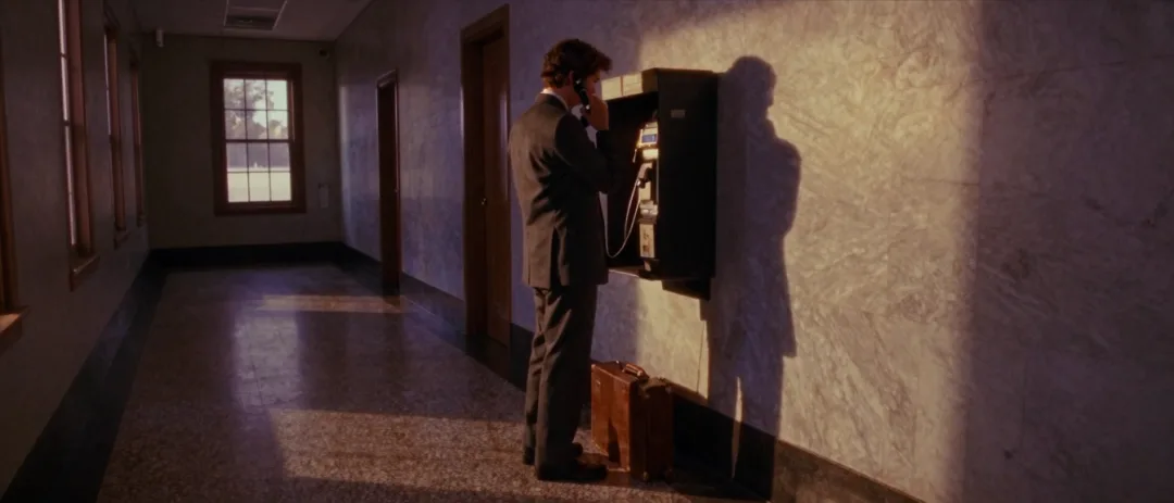An attorney on a payphone outside the courthouse, 1996.